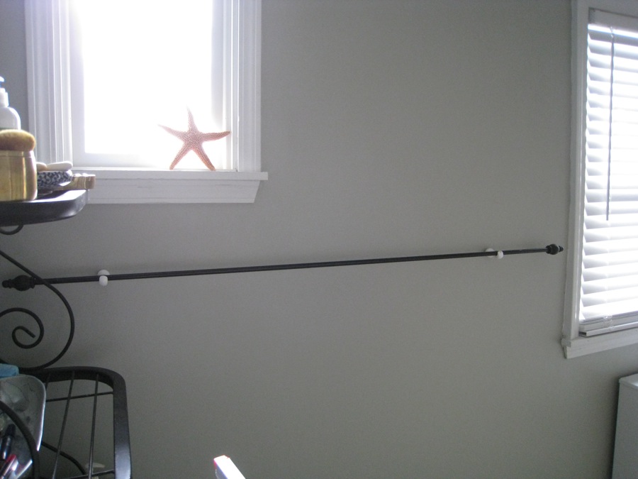 My bathroom curtain rod turned towel rack.