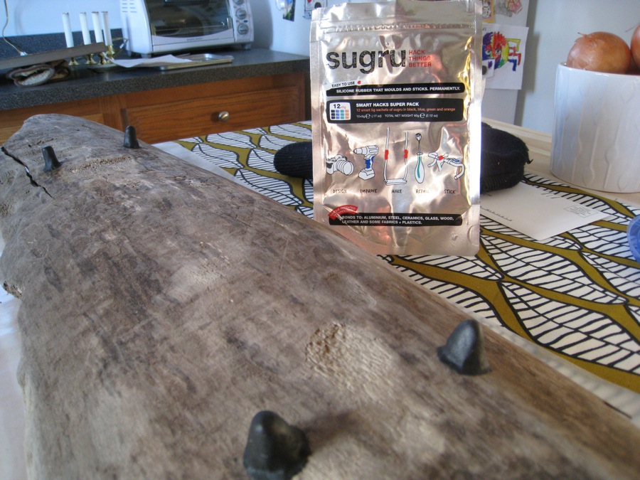 Sugru feet installed, and ready to start curing. Sugru feet installed, and ready to start curing.