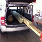 Lumber loaded in. 8-footers are the only boards that can fit in and still let the Jeep gate close.