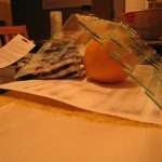 Building the roof. The grapefruit ended up being the perfect support piece to make sure the pitch didn't fall while the silicone dried.