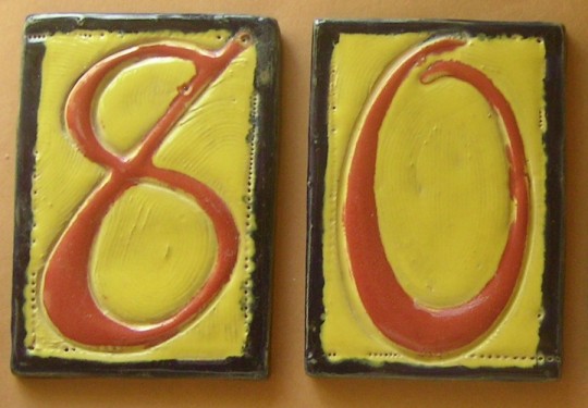 Clay tile numbers from Cirrelda's etsy shop.
