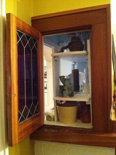 Leaded glass door that opens into the living room. Second access point to my new one-stop-shop.