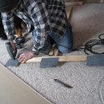 Crafting the T-brace that will support the ceiling drywall while it's being installed.