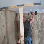 T-brace in action. I was also risking my life by letting go of the drywall to snap this shot.