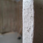 Fibers in the cut drywall.