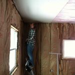 Board one. Looking skeptical at our abilities. We put lots of screws in that first sheet.