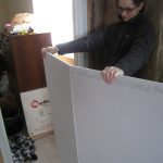 Scoring and breaking drywall.