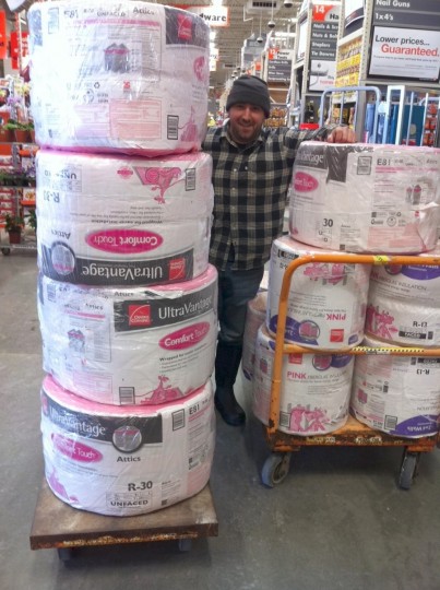 Pete and some of our 19 rolls of insulation.