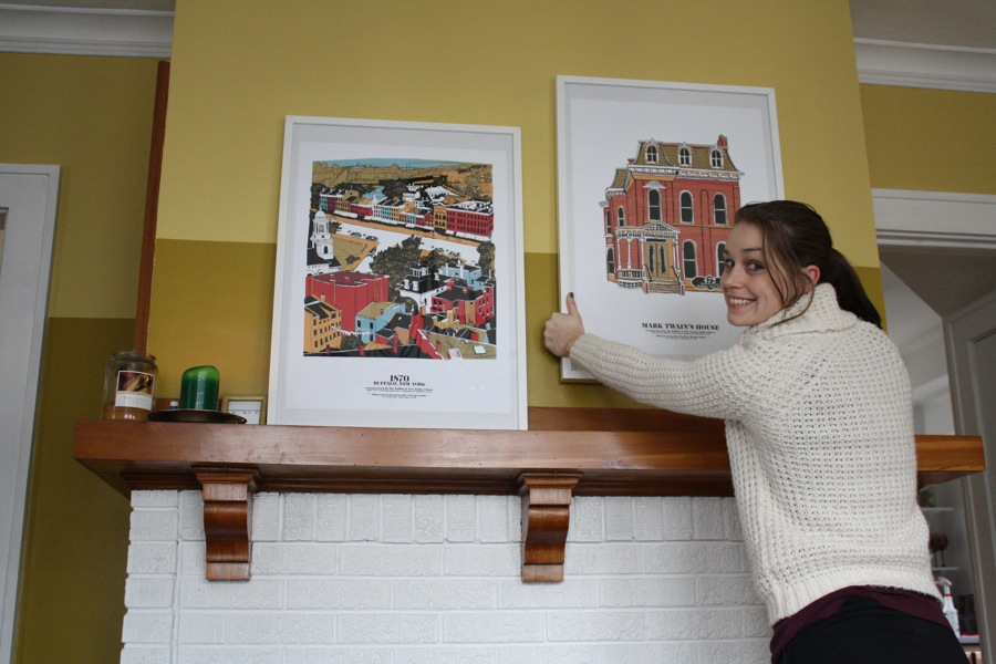 Hanging unmatted artwork.