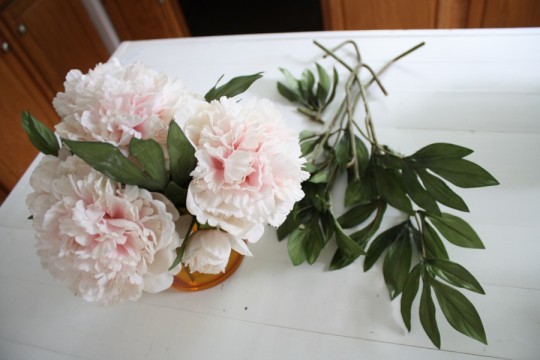 Shortened the faux-peonies with the help of some wire cutters.