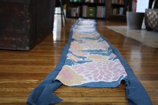 Long strips of piping stuffed with t-shirts and sewn to the circumference of the bed.