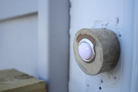 Completed and attached doorbell.