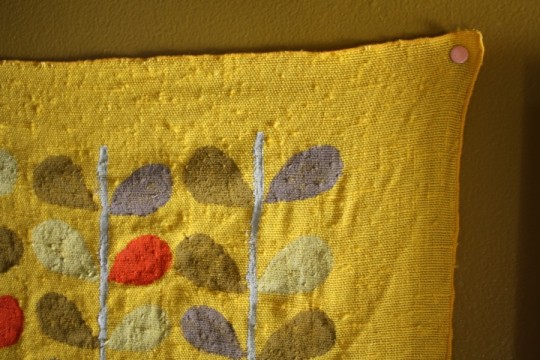 Cute pink tacks as an interim hanging mechanism.