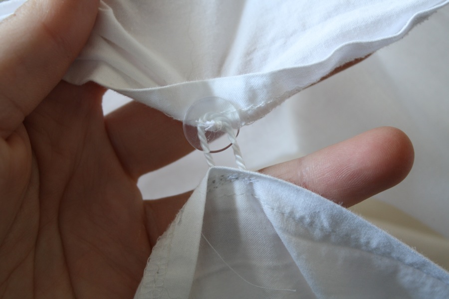 Fixing a duvet cover.