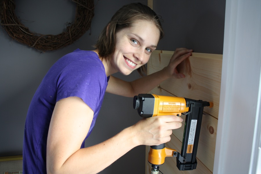 Installing shiplap wall.