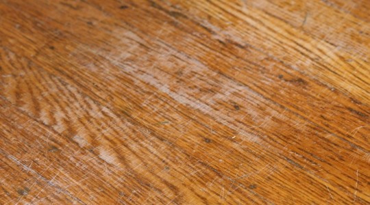 A damaged dining room floor.