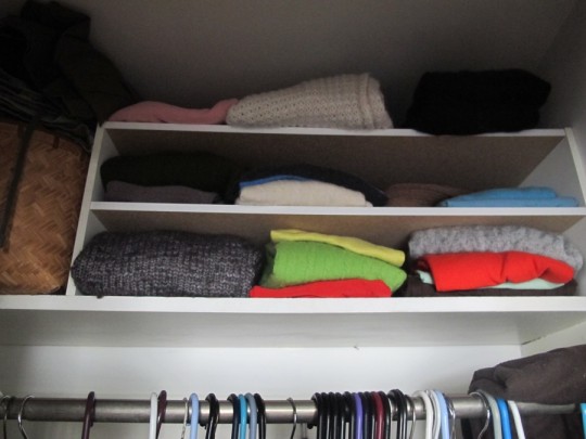 Shoe rack turned adequate sweater storage.