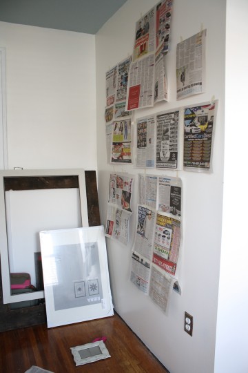 Frame templates out of newspaper help to organize your wall... and your life.