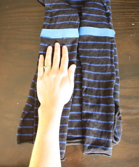 Sweater sleeves, taped to length.
