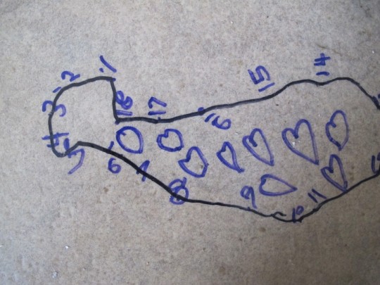 Coloring on the vinyl floor.