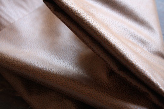 Leather or pleather? I'm so happy with this el-cheapo find.