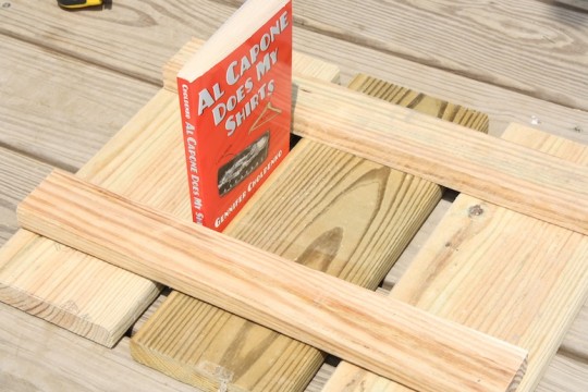 Using a book for a board spacer.