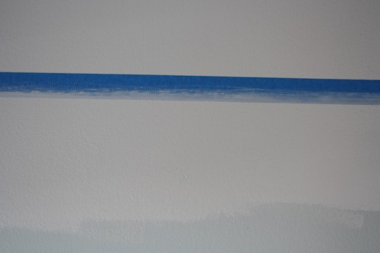 Quick tip: Paint in the same color along the side of the tape that you don't want to bleed.