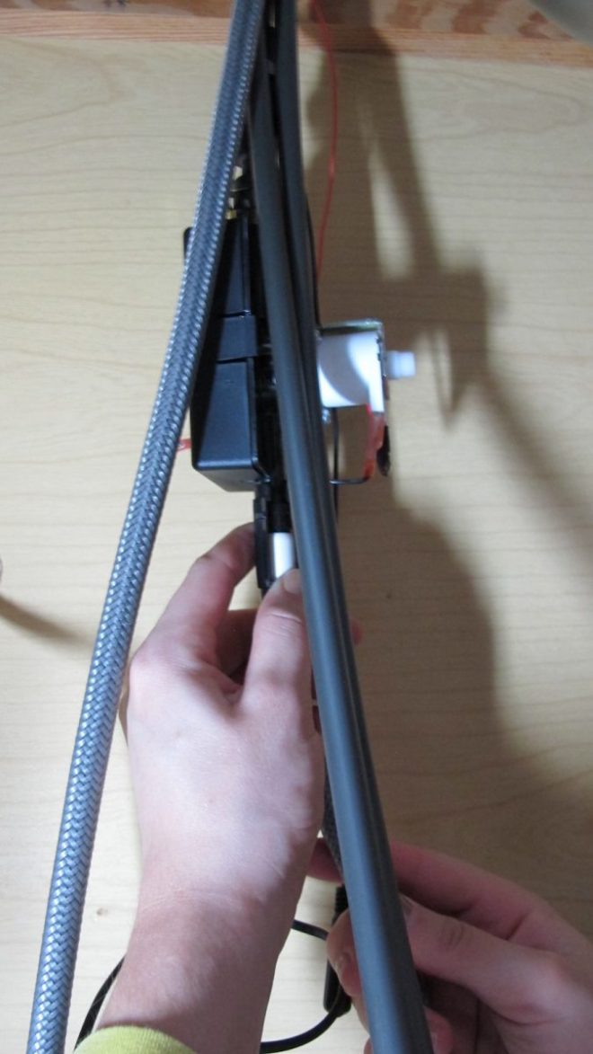 Installing the sprayer to the faucet.