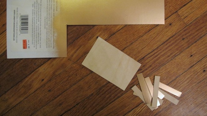 I cut the pieces of birch veneer to create the strips of bunting.