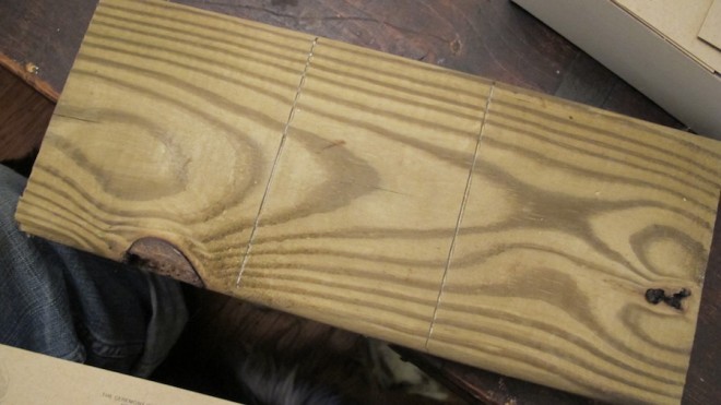 As a way to align creases, Pete notched out parallel lines on a scrap board.