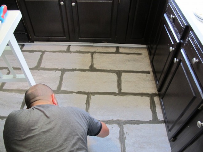 New grout needed between our kitchen floor tiles.