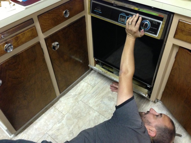 Self-removal of the old dishwasher.