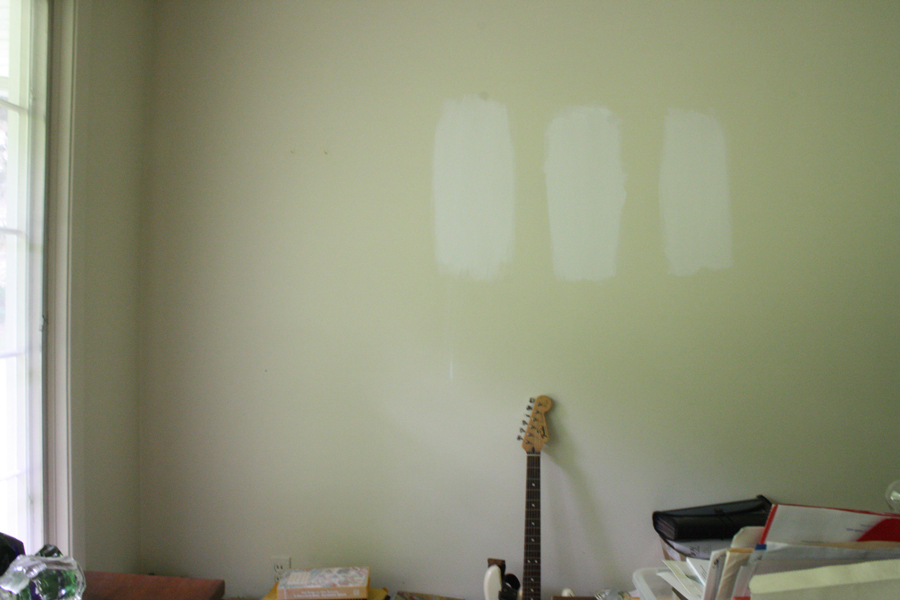 Sampling three Sherwin Williams paints: Extra White, Snowbound, and Alabaster