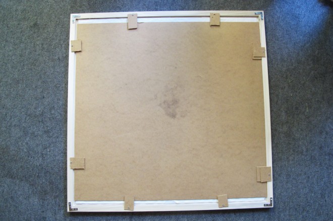 Recycled backer board for this large frame.