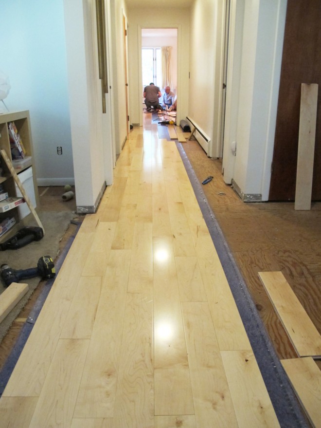 Installing the maple floors in our ranch home!