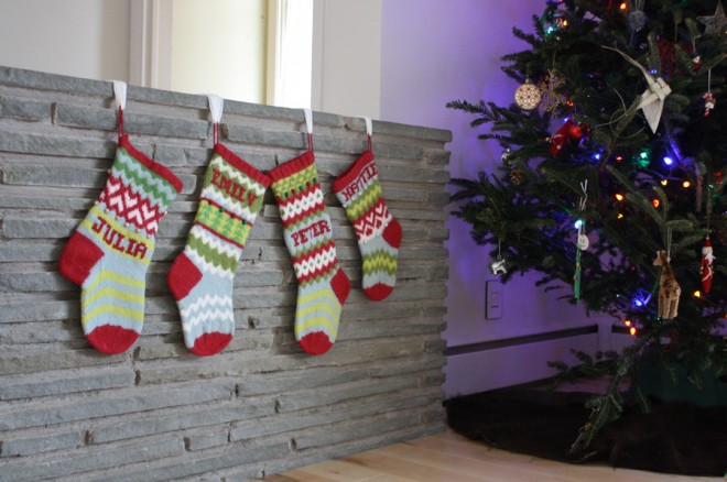 Handmade wool Christmas stockings by Erin Makes Stuff.