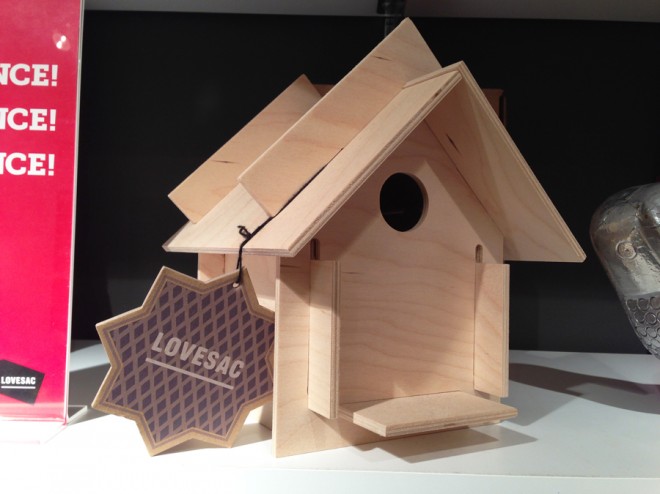 Traditional light wood birdhouse from Lovesac.