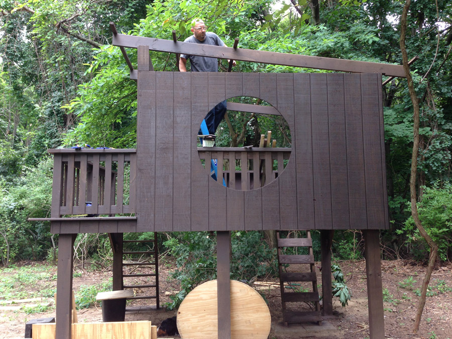 Installing pieces of roof framing on our modern treehouse.