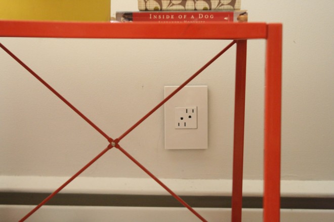 Electrical outlet by Legrand adorne in Gloss White.
