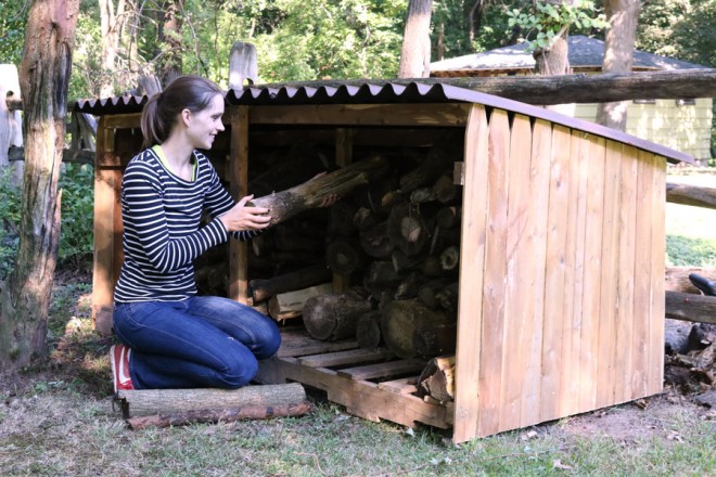 Make better use of your backyard space with a wood storage container made of an upcycled fence post.