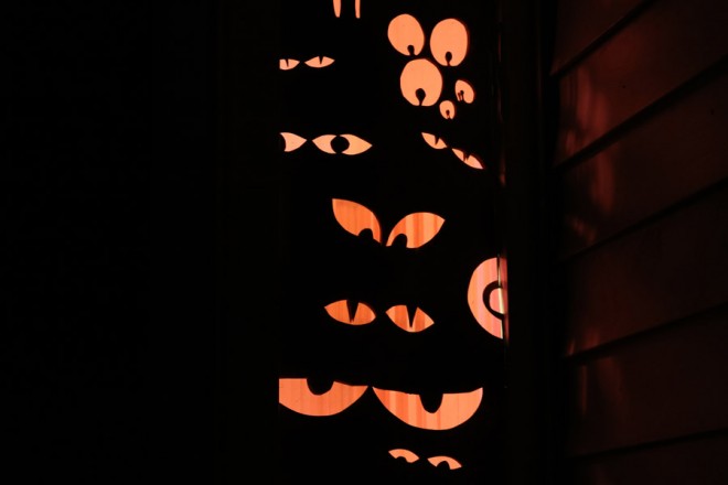 Decorate your windows for Halloween with little peeping monster eyes.