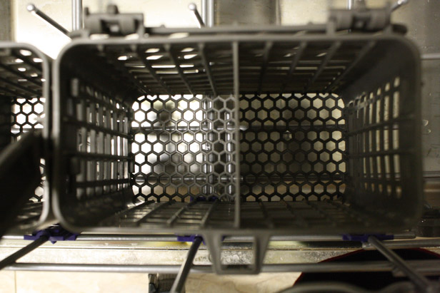 How to clean the silverware tray of the dishwasher.