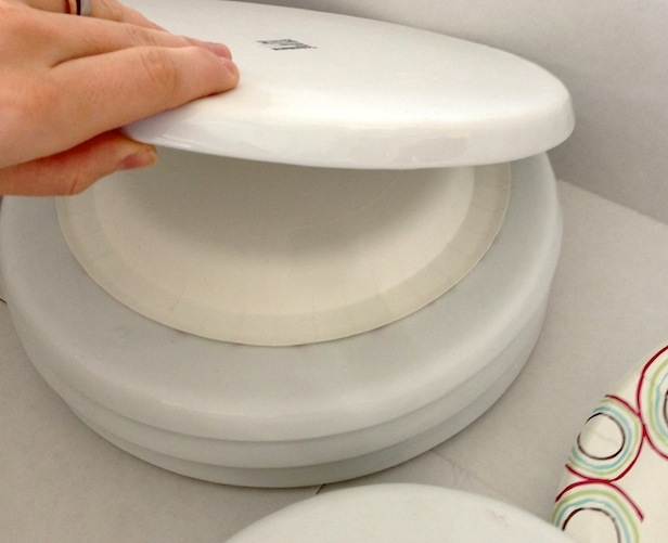 Use paper plate dividers when packing kitchen plates.
