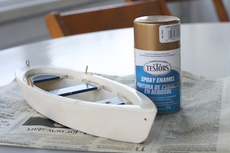 Upgrade a thrifted boat with shiny gold paint.