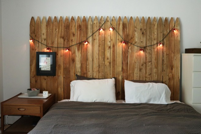 Upcycle a fence panel into a king-size headboard for the bedroom.