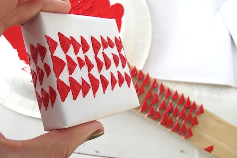 Make a custom, modern stamp using a wood block and utility tape from the home.