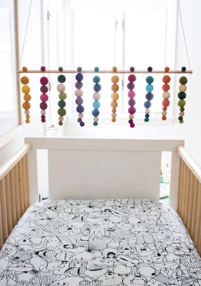 A colorful handmade beaded mobile for the baby's nursery.