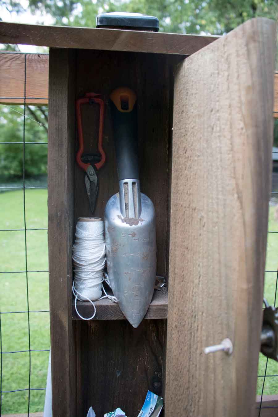 DIY garden storage to keep tools and accessories dry.