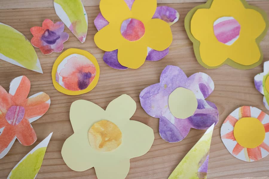 Watercolored and cut flowers to decorate an Easter or Passover or springtime-themed headband.